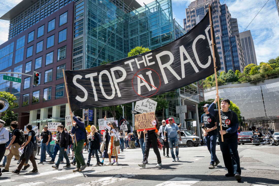 Demonstrators participate in the "Stop the AI Race" protest march in San Francisco, California, on July 11, 2026.