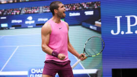 Spain's Carlos Alcaraz celebrates his defeat of Novak Djokovic