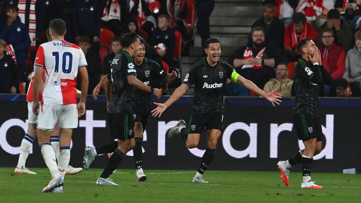 Lens players celebrate after scoring the 2-3 during the UEFA Champions League football match between Slavia Prague and Lens in Prague, on September 10, 2026