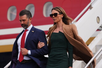 Donald Trump Jr and wife Bettina disembark Air Force One 
