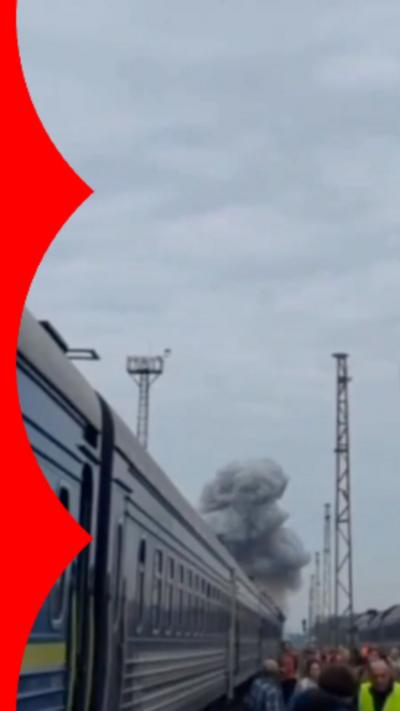 Smoke after Russian drone hit a passenger rain in Ukraine