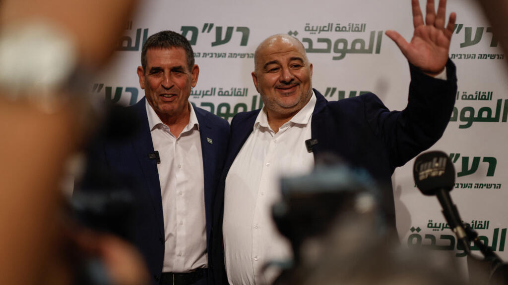 Leader of the Arab Israeli party Ra'am (United Arab List) Mansour Abbas (R) and Israeli politician Yoav Segalovitz (L) attend a news conference in Nazareth on August 31, 2026. 