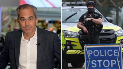 Daniel Sandford (l) and an armed police officer with a 'police stop' sign in the foreground (r)