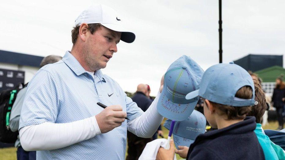 Robert MacIntyre signing autographs at Kingsbarns