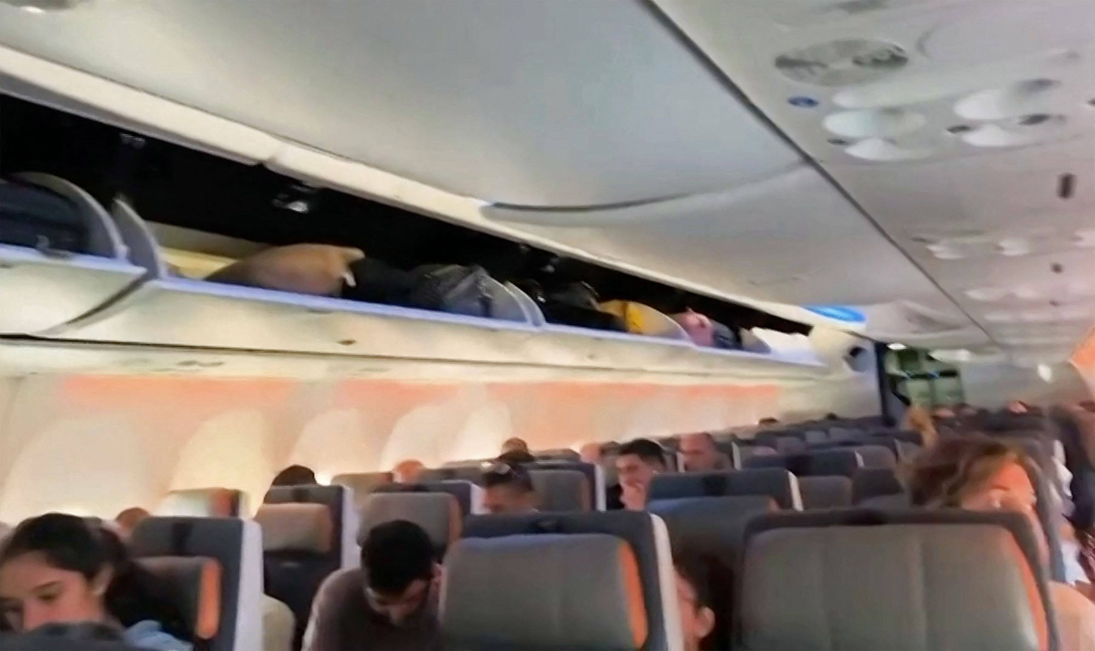 Passengers inside the rerouted Flydubai flight FZ 1073 ahead of its departure to Tel Aviv from Saudi Arabia’s Tabuk airport. Photo: AFP