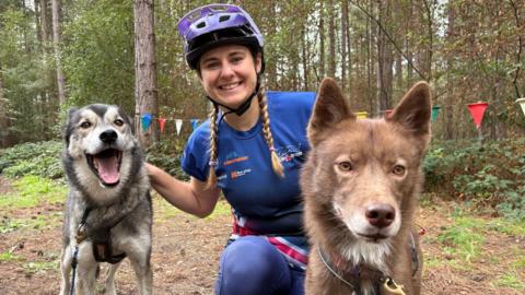 Danielle and two huskies