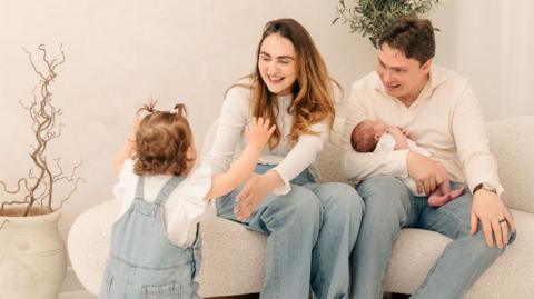 Richard and Caitlin Brain and their two children