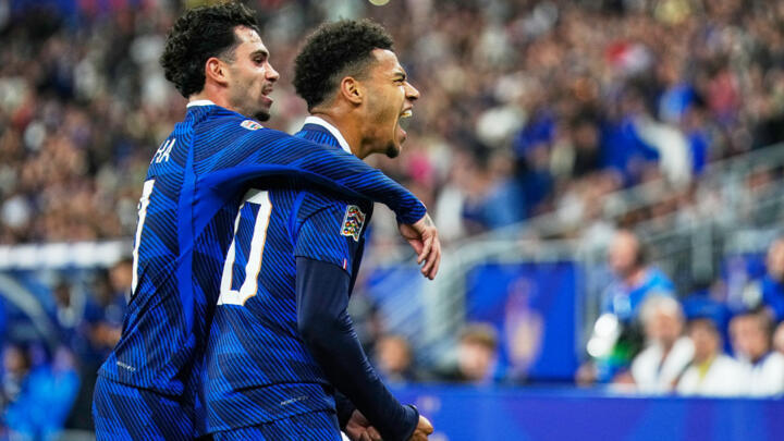 France's Desire Doue, right, celebrates after scoring during the Nations League soccer match between France and Belgium in Saint-Denis near Paris, on October 5, 2026