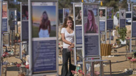 People visit the site of the Nova music festival near Kibbutz Reim, in southern Israel.