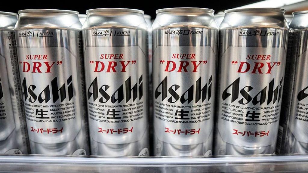 Asahi Super Dry beers are seen on display at a supermarket in Tokyo on October 3, 2025. 