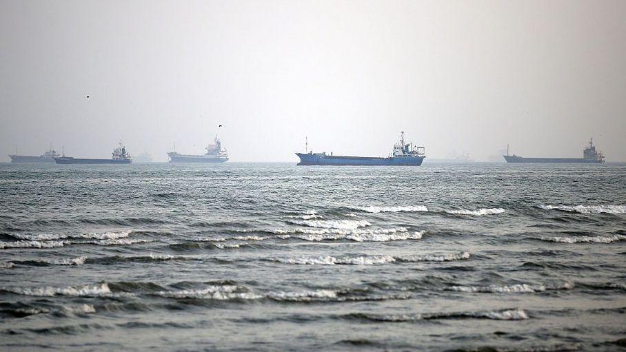 File photo showing merchant vessels belonging to Iran and other countries at anchor in the Strait of Hormuz, off Bandar Abbas, Iran (10 September 2026)