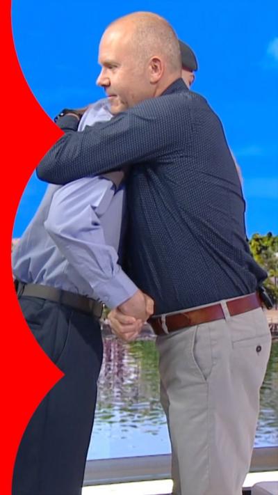 A man hugging a cadet