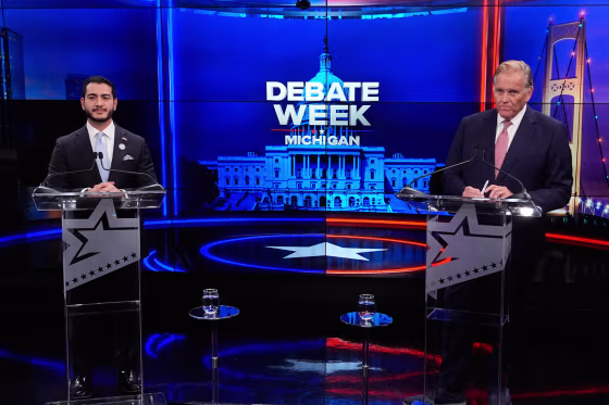 Democratic nominee for U.S. Senate Abdul El-Sayed, left, appears with Republican nominee Mike Rogers during a televised debate on Oct. 8, 2026, in Grand Rapids, Mich.