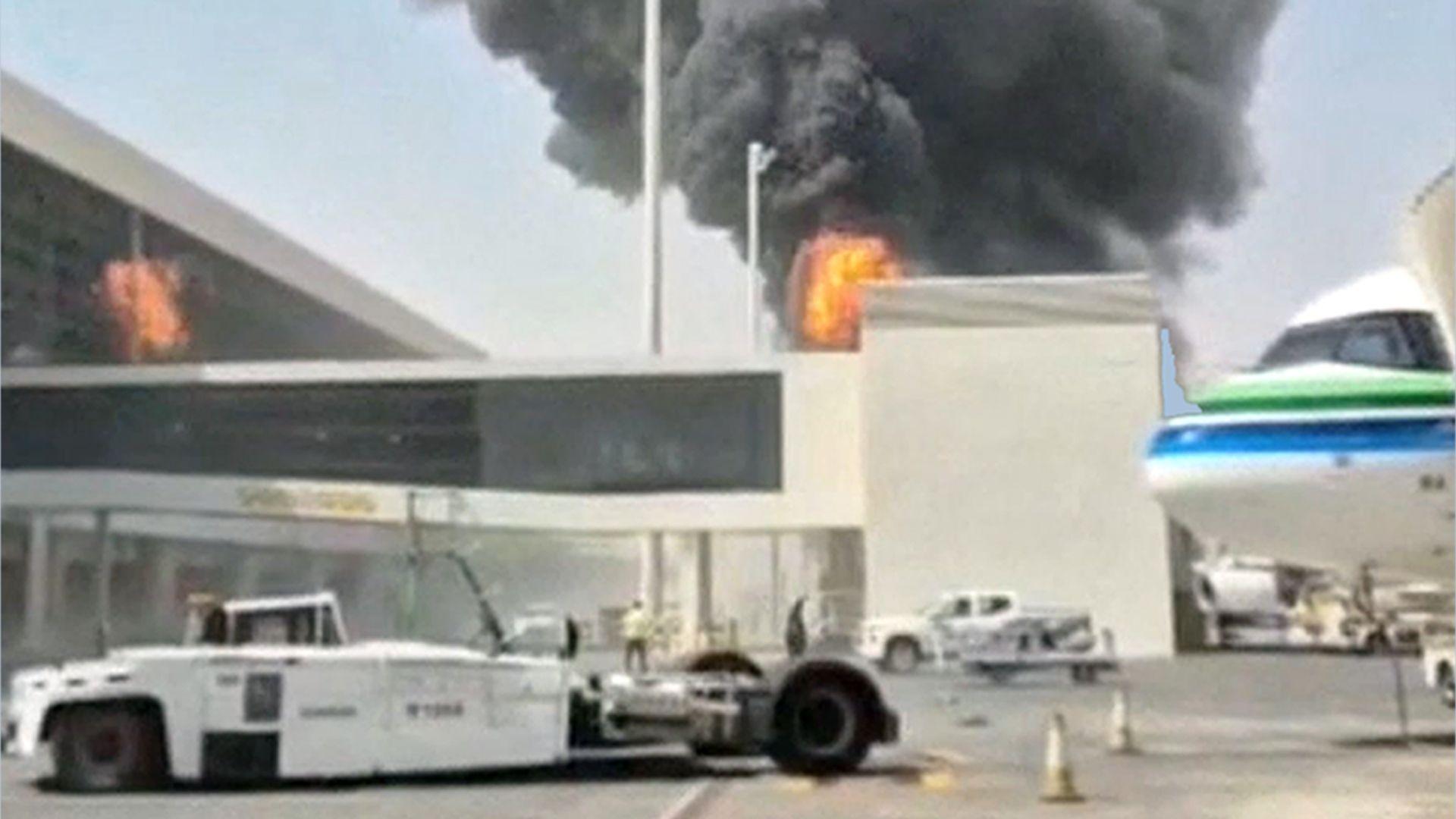 smoke and flames seen at King Khalid airport in Riyadh, 8 Oct