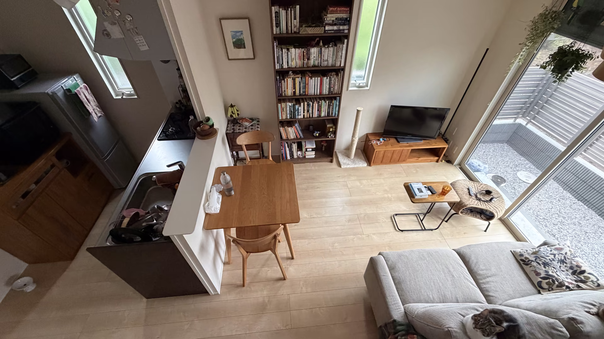 wide angle ceiling view of a living room, making the whole room visible