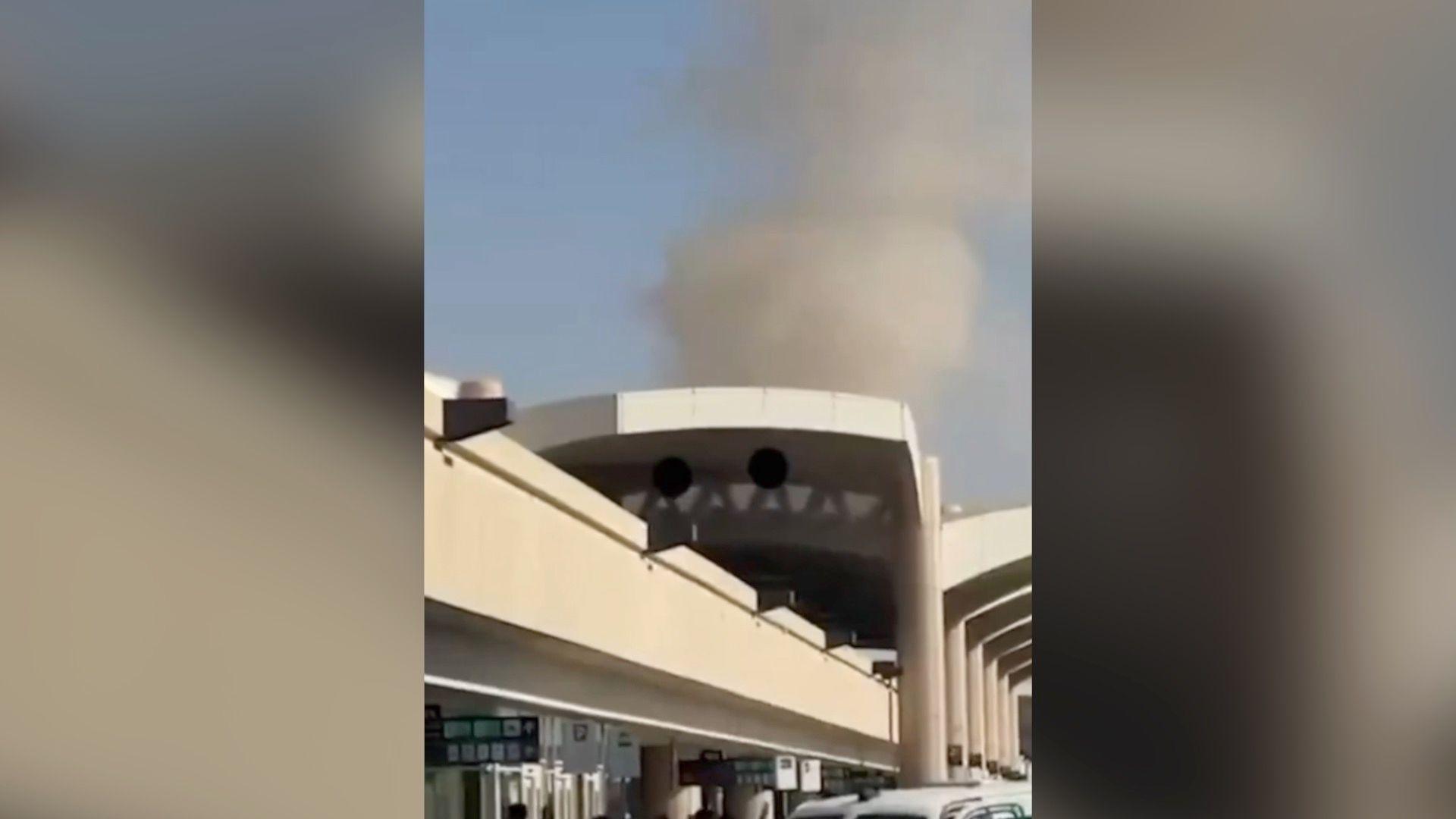 Smoke rises above King Khalid airport in Riyadh.