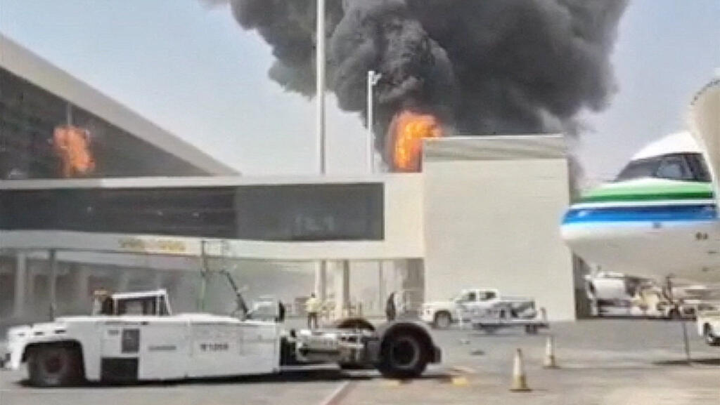 Smoke and flames rise from King Khalid Airport, after Yemen's Iran-aligned Houthis said they attacked the airport, in Riyadh, Saudi Arabia