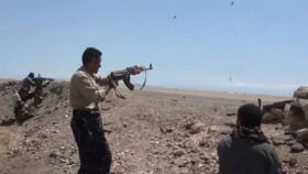 This image was taken from an undated video released on October 5, 2026, by the Yemeni government-allied Southern Giants Brigades media office. The group says it shows its fighters exchanging fire with