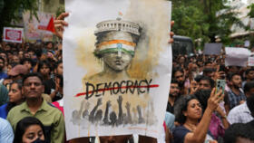 A Cockroach Janta Party supporter at a protest in Mumbai, July 19, 2026, to demand the resignation of India's education minister.