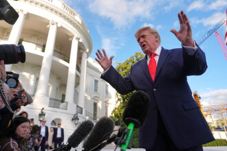 President Donald Trump walks to board Marine One 