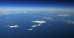 Chinese delegation visits island disputed between Japan, Russia