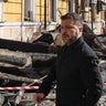 Ukraine's President Volodymyr Zelenskyy views damage from a drone strike in Kyiv 