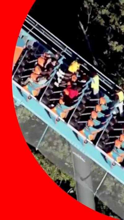 Image shows people stuck on a roller coaster.