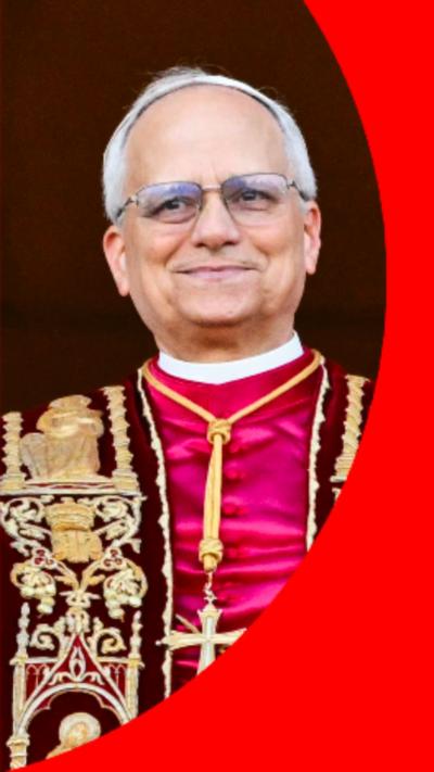 Pope Leo has short white hair, is wearing glasses and red, white and black and gold vestments.