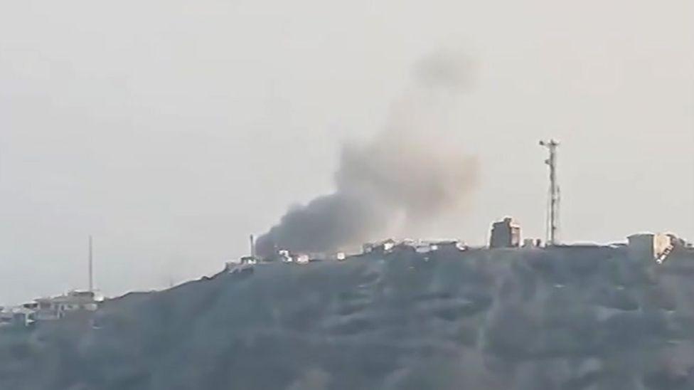 A screengrab of a verified social media video showing smoke rising from the presidential palace in Aden, southern Yemen, following a Houthi missile attack (15 October 2026)