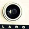 Rank 4 of 50,000 · activation 4.129 Dark circles, natural image crop, rank 4