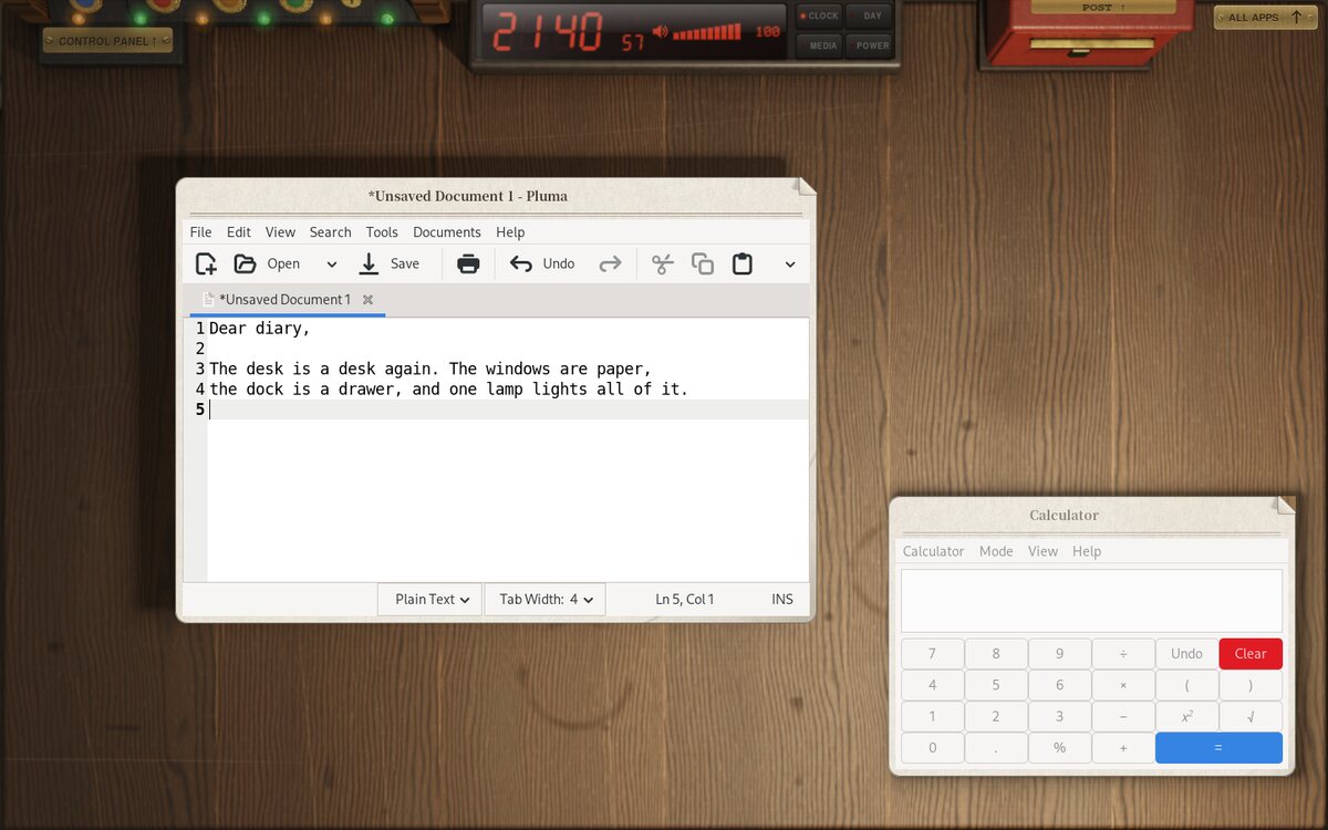 The desk: two programs on paper, the clock, the Control Panel at the back left and the post box at the back right