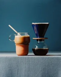Blue studio set with a coffee dripper and mugs