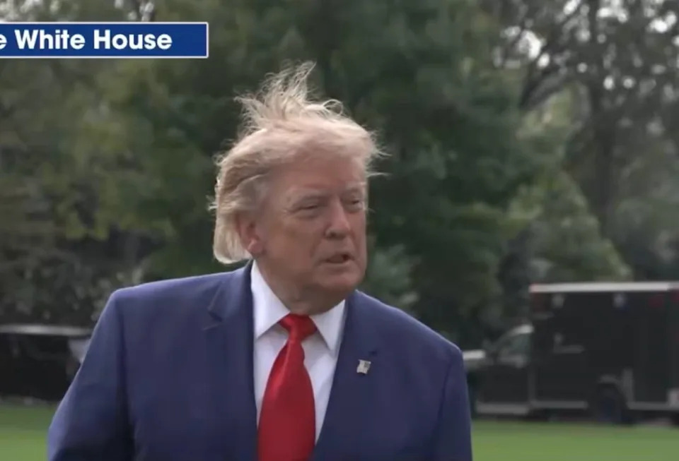 Donald Trump's hair goes wild during a press gaggle on Oct. 16. / Screenshot