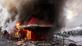Masked youths clashed with police and fires were set in several cities, including Paris.