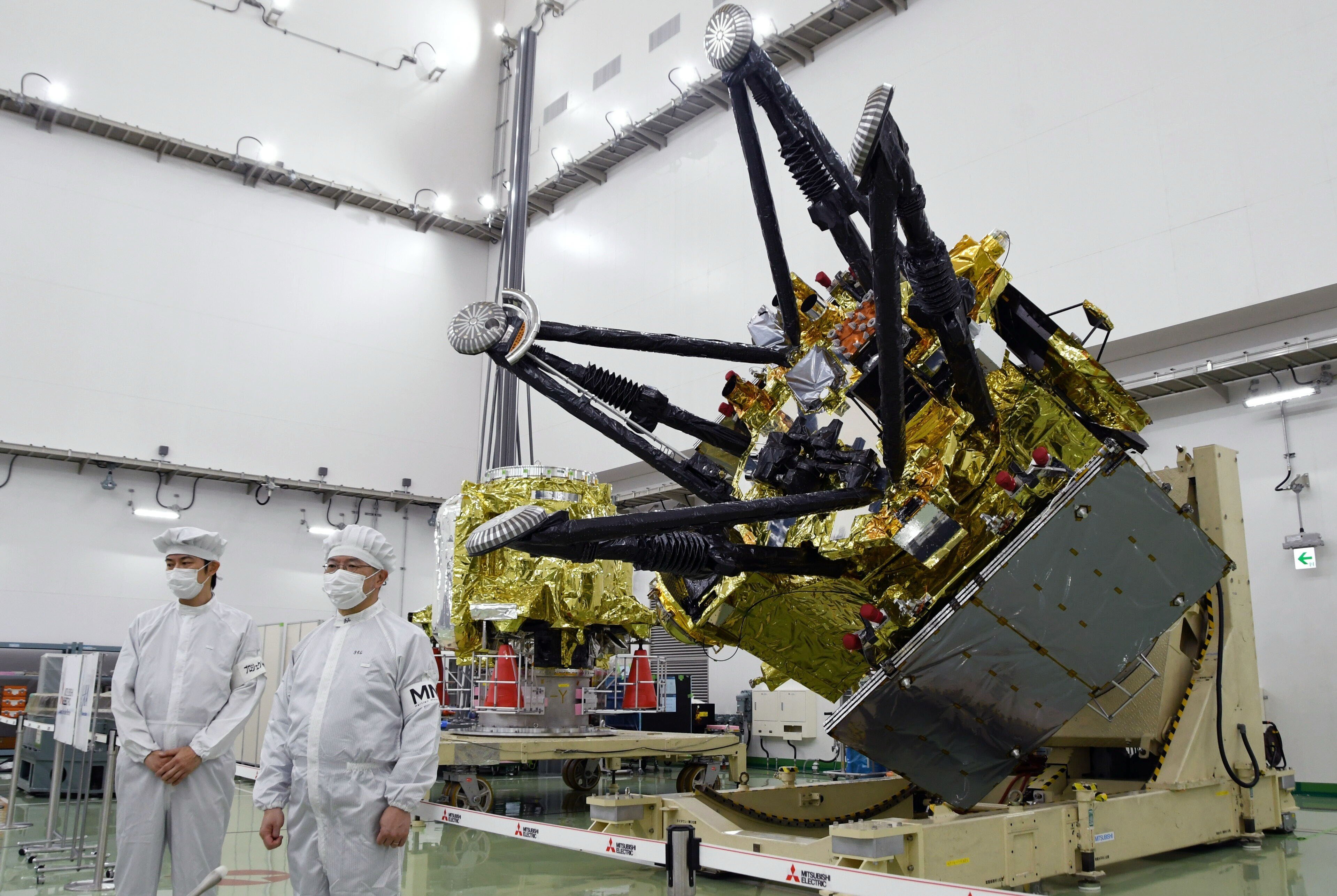 The Japan Aerospace Exploration Agency unveils a spacecraft for its Martian Moons eXploration mission at the Tanegashima Space Center in Minamitane, southwestern Japan, on August 13. Photo: AP