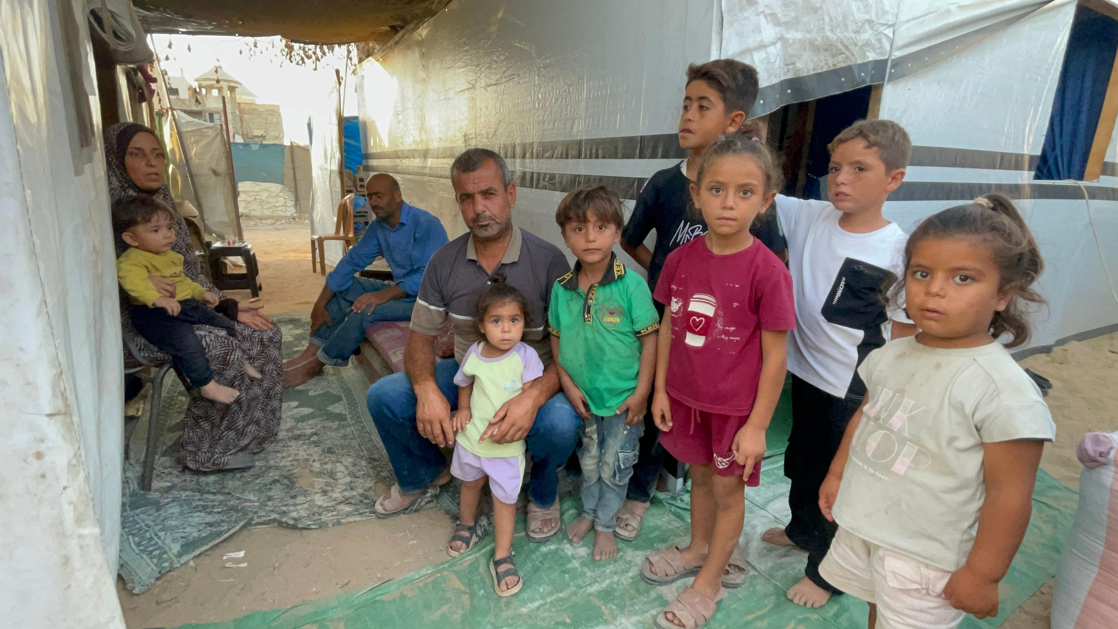 Dalal al-Dahdouh (L) and her family in Gaza City, northern Gaza