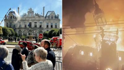 Splitscreen shows people watching destroyed town hall on the left, and town hall on fire on the right