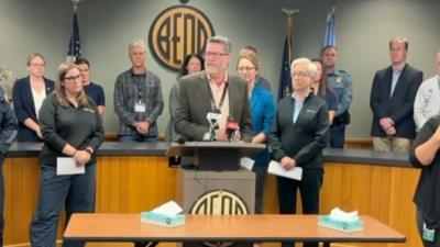 Steven Cook, school superintendent at a lectern