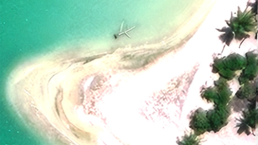 A satellite image shows the Taraia Object in a lagoon on Nikumaroro