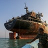 Thailand-flagged vessel struck near Strait of Hormuz awaits removal off Iran's Qeshm Island 