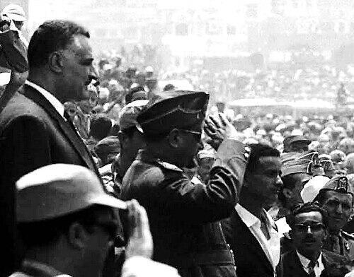 Egyptian President Gamal Abdel Nasser (standing to the left) welcomed by Yemeni crowds on his visit to Sanaa, April 1964. In front of Nasser is Yemeni President al-Sallal, saluting Egyptian President Gamal Abdel Nasser (standing to the left) welcomed by Yemeni crowds on his visit to Sanaa, April 1964. In front of Nasser is Yemeni President al-Sallal, saluting