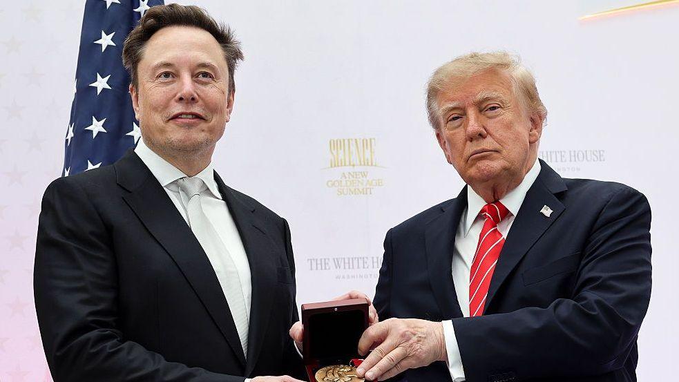 Elon Musk receives the National Medal of Science from US President Donald Trump during the Golden Age of American Innovation Summit at the Institute of Peace on October 08, 2026 in Washington