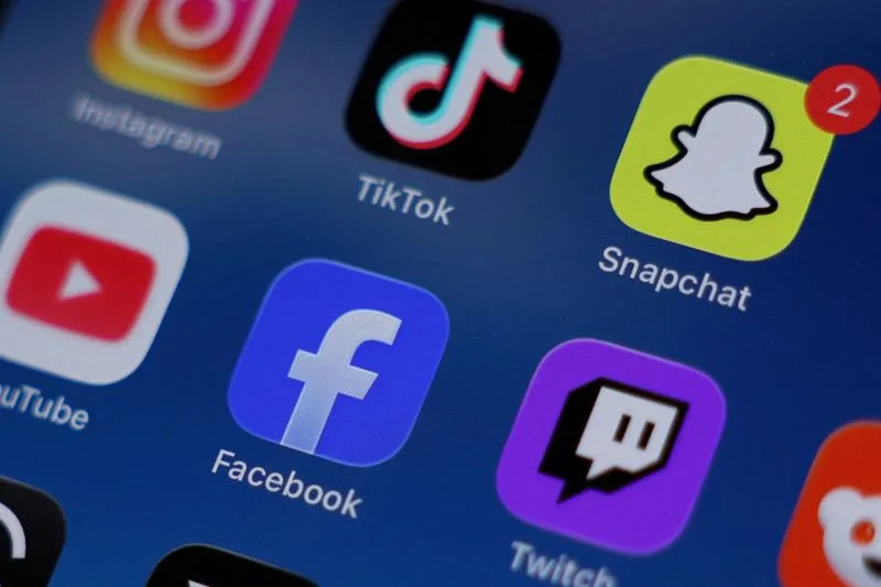 FILE PHOTO: Social media apps are displayed on a mobile phone