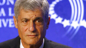 robert rubin in 2007 file photo with a blue and white background