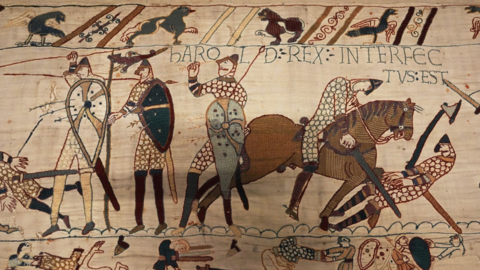 The section of the Bayeux Tapestry depicting the ‘arrow in the eye’ moment and the death of Harold, on display at the British Museum in London.