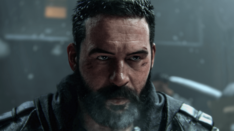 A character from Call of Duty Modern Warfare 4. The soldier has short dark hair and a beard with scars above his left eye. He has a serious expression as snow falls behind him in a darkened backdrop. 