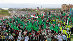 Supporters of Jordan's Muslim Brotherhood take part in a demonstration expressing solidarity with Palestinians near the country's border with the Israeli-occupied West Bank.