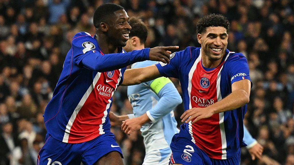 Ousmane Dembele and Achraf Hakimi celebrate PSG's goal against Manchester City